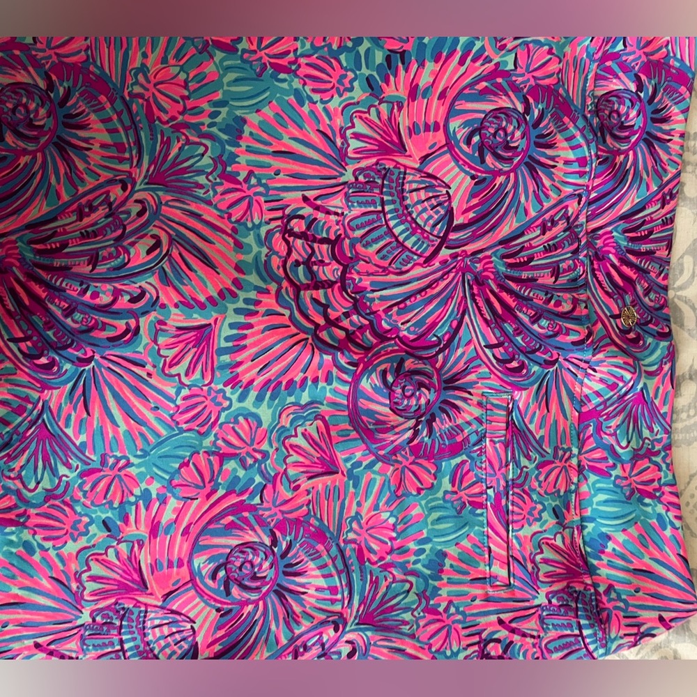 Lily Pulitzer skort, polyester spandex. Front hidden pockets size 14